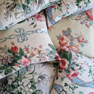 chintz cushions by Phillips And Cheers